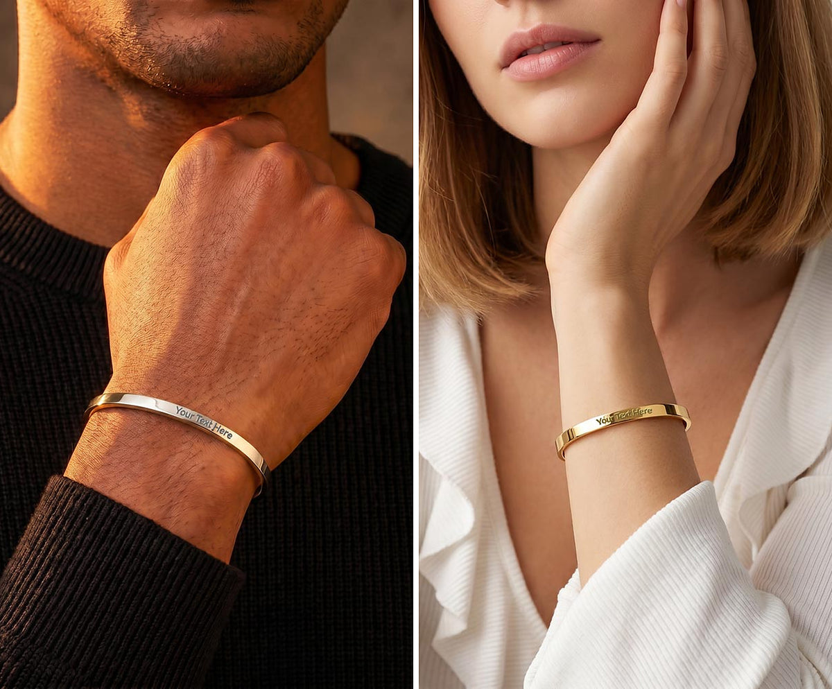 Two wrists side by side: a man wearing the polished steel engraved cuff, a woman wearing the 18k gold finish engraved cuff